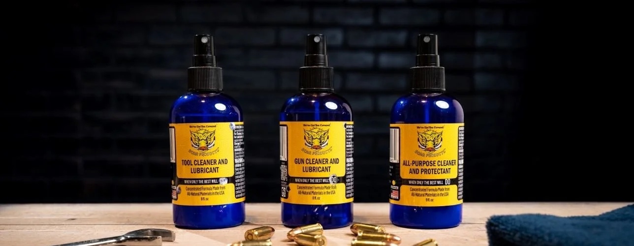 Premium gun cleaning supplies on a workbench