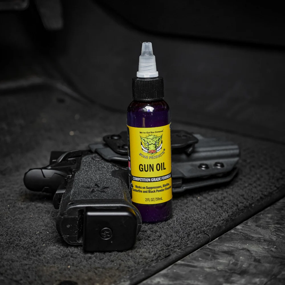 Premium gun cleaning supplies on a workbench